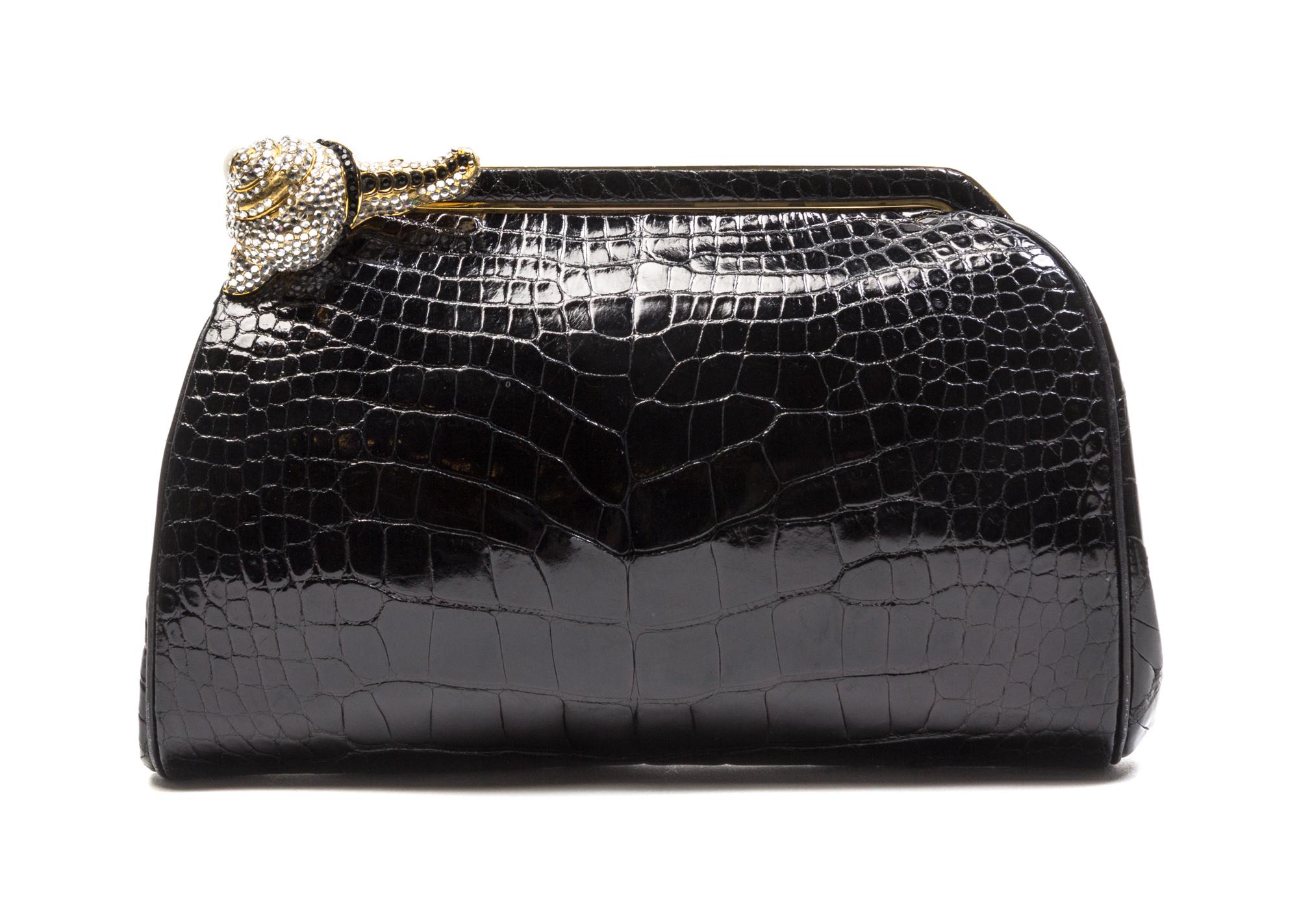 A Judith Leiber Black Alligator Evening Bag, 8 1/2 x 5 1/2 x 1 1/2 inches.