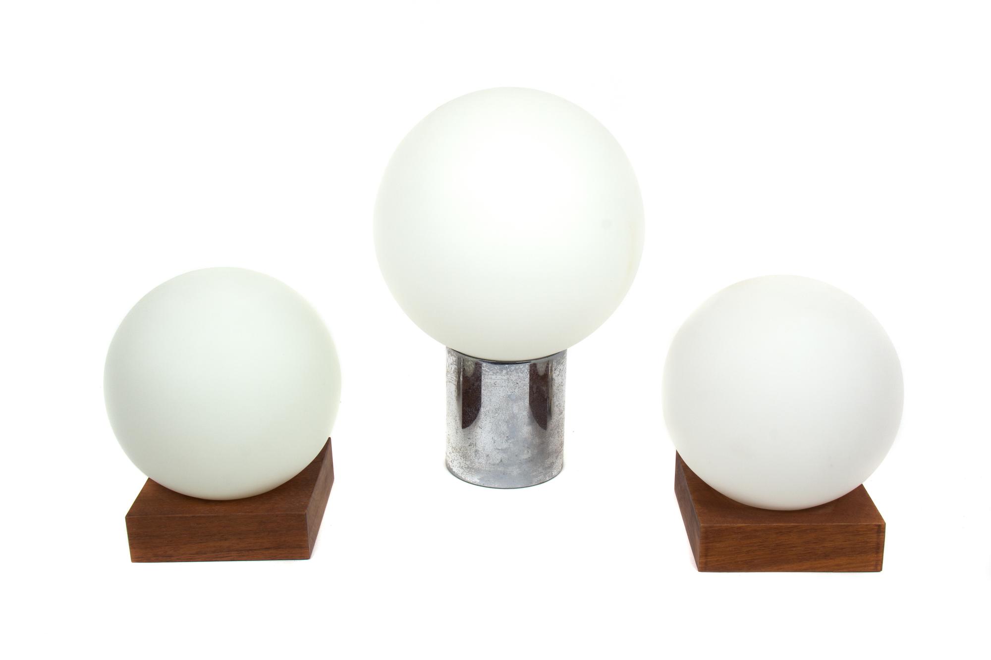 Three Mid-Century Frosted Glass Globe Form Table Lamps Height of tallest 14 inches.