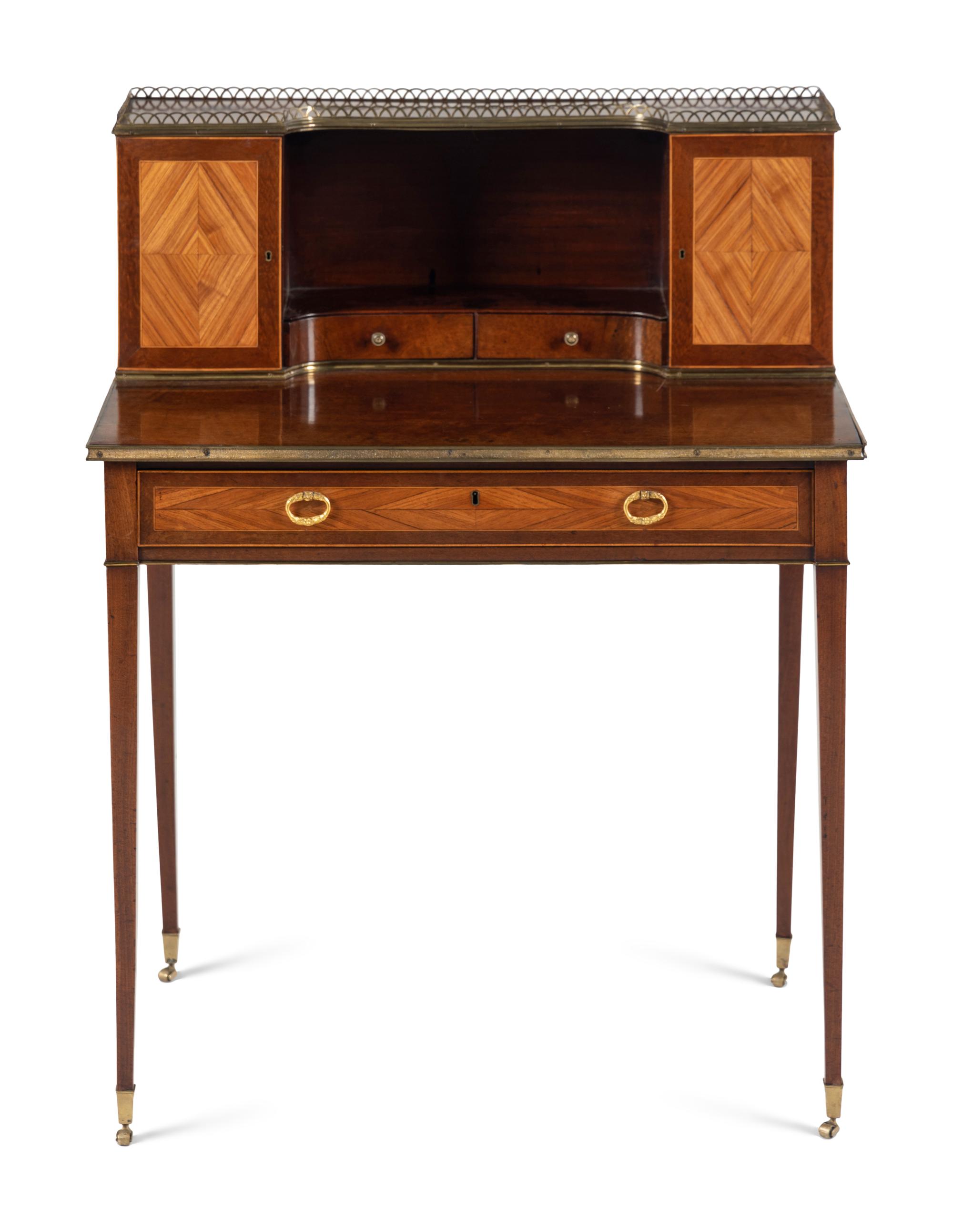 A Regency Tulipwood and Mahogany Bonheur du Jour
