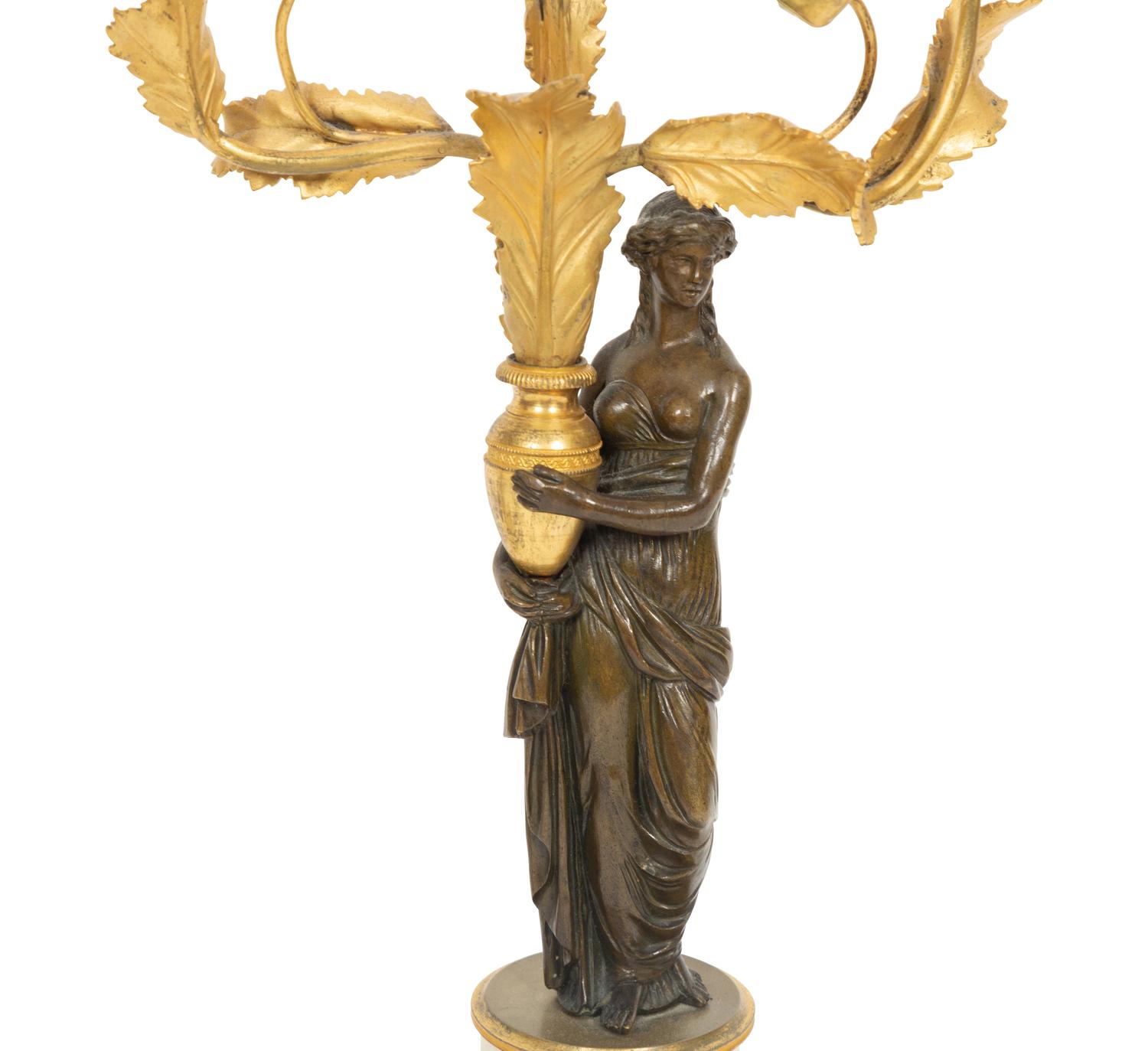 A Pair of Lous XVI Style Gilt and Patinated Bronze and Marble Figural Candelabra