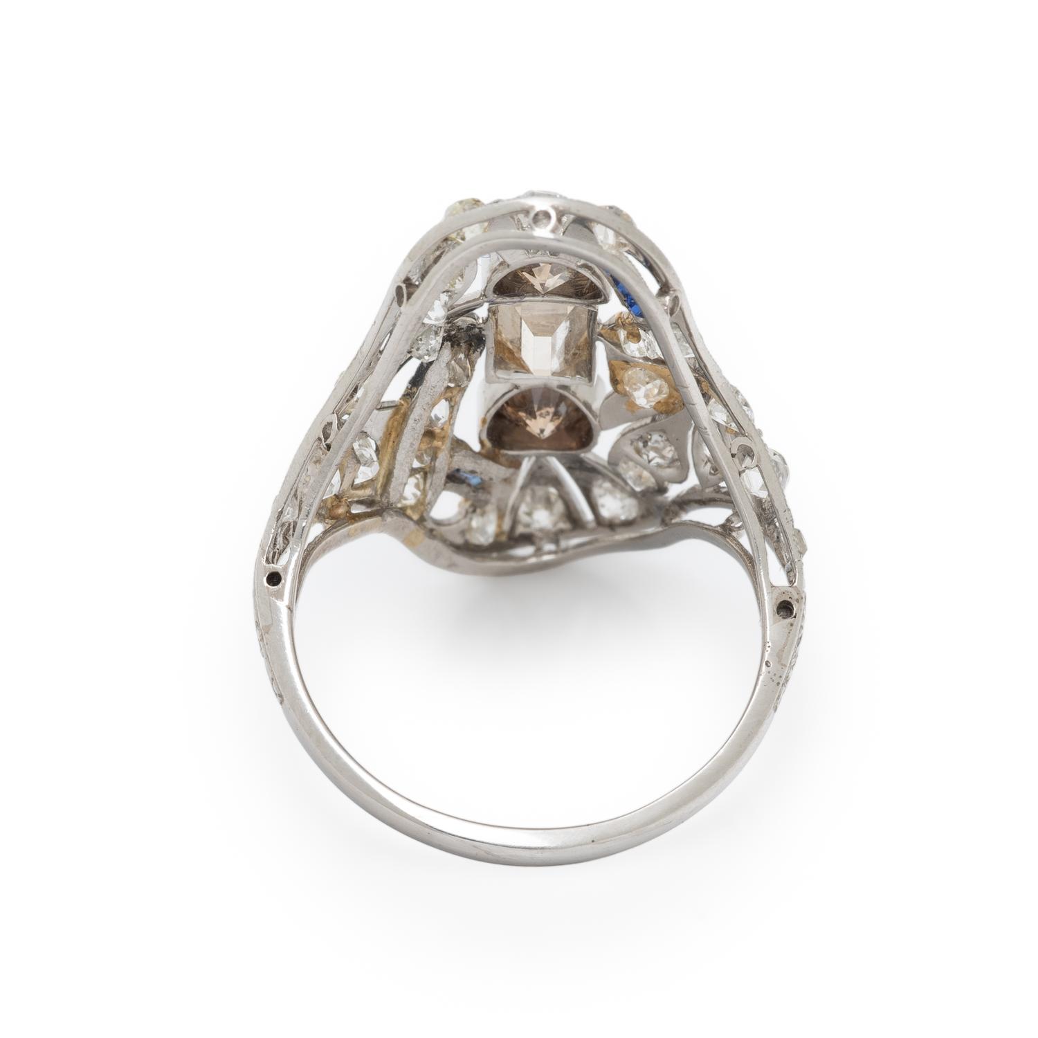 COLORED DIAMOND, DIAMOND, AND SYNTHETIC SAPPHIRE NAVETTE RING