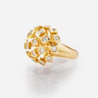 An 18K Yellow Gold and Diamond Ring
