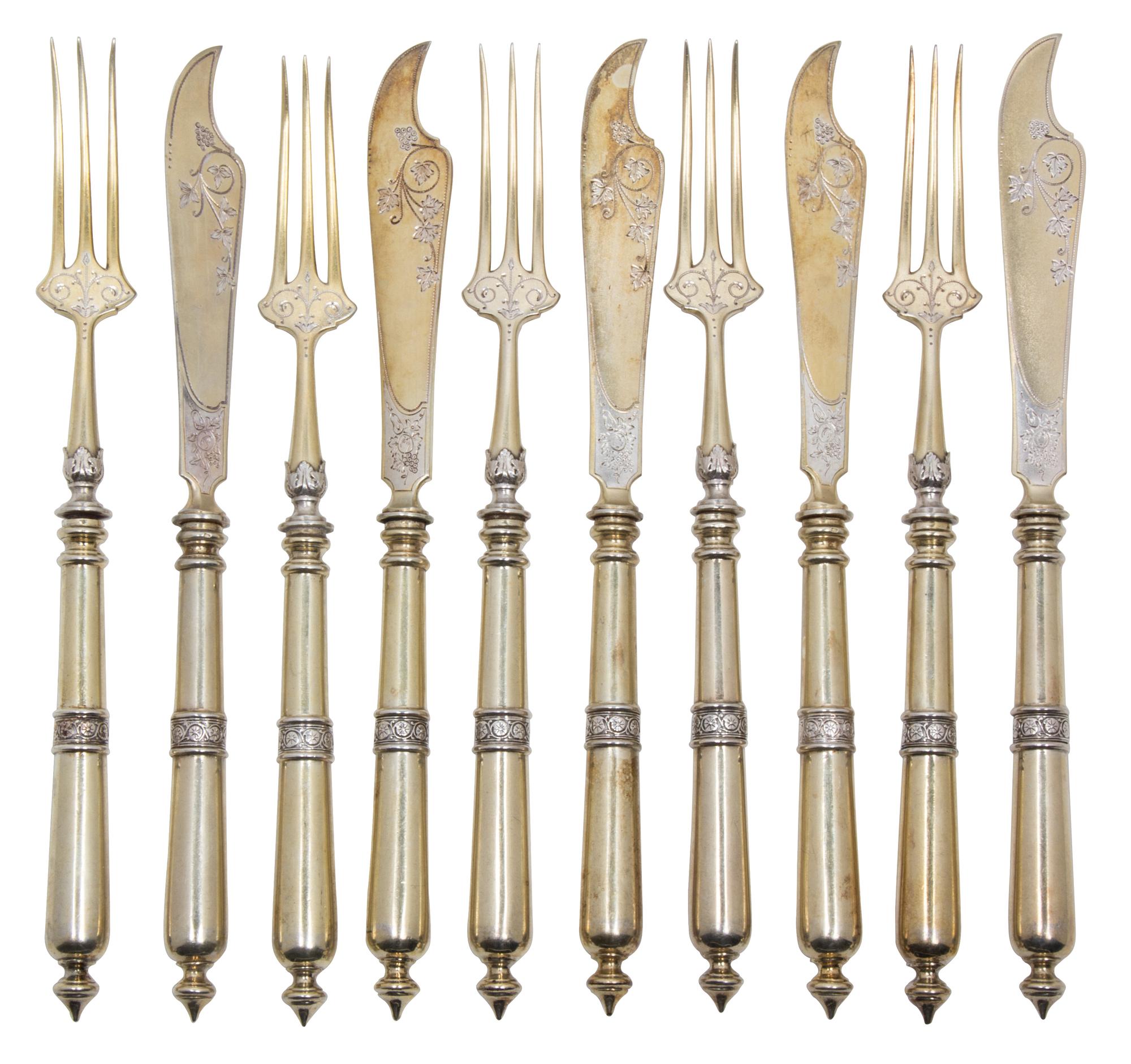 A German Vermeil Silver Fish Service, Hassenberg & Co., Frankfurt, Ealry 20th Century, comprising: 16 forks 16 knives in a fitted box 3