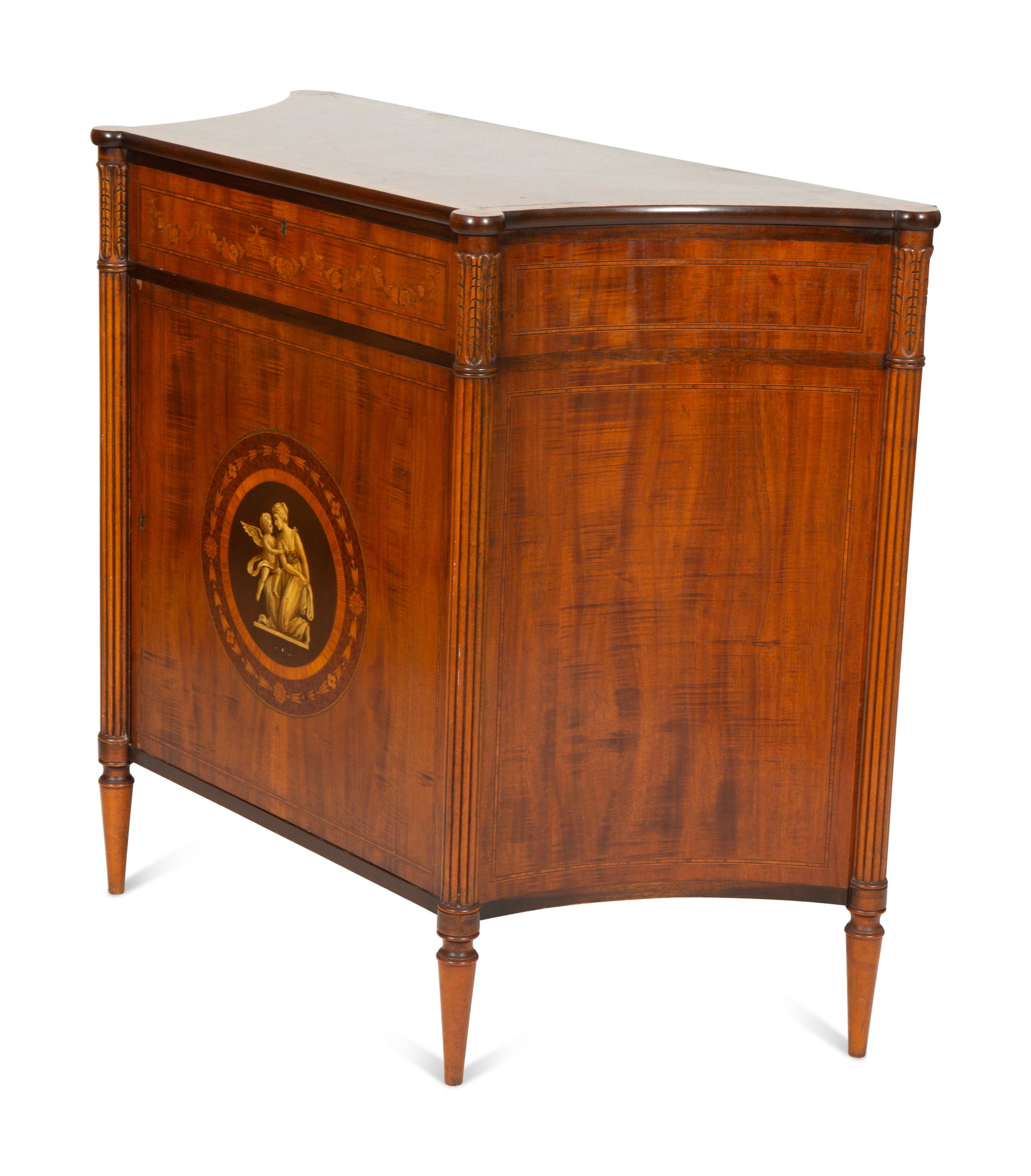 A Joseph Gerte Mahogany and Marquetry Commode