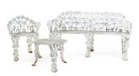 An Assembled Suite of Victorian Wrought Iron Garden Furniture Width of settee 66 inches. — 19TH/20TH CENTURY