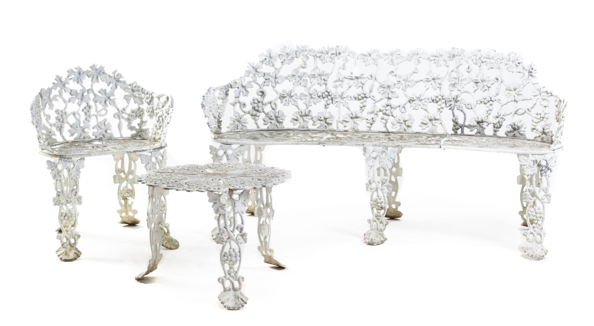 An Assembled Suite of Victorian Wrought Iron Garden Furniture Width of settee 66 inches. — 19TH/20TH CENTURY