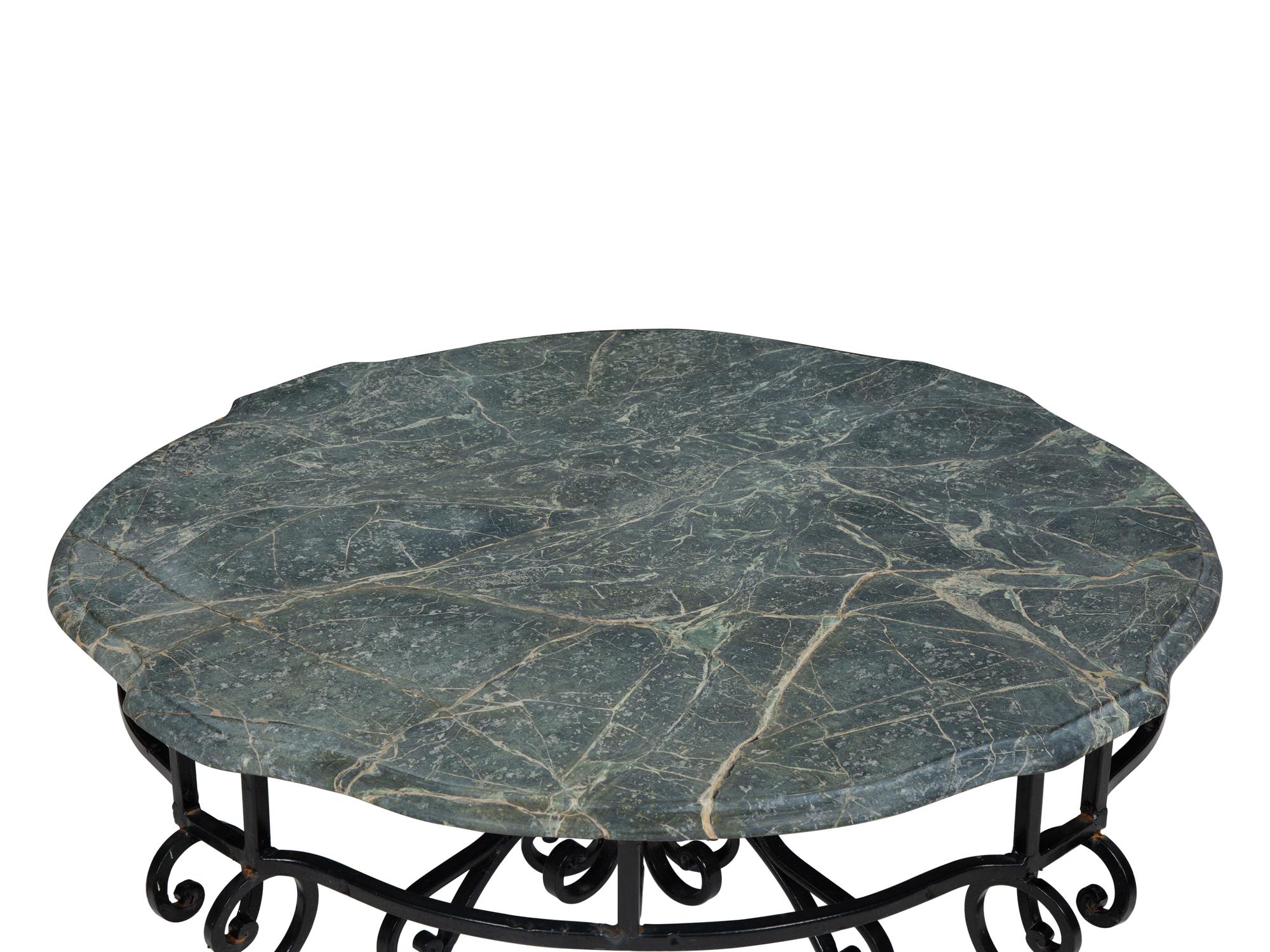 A Wrought Iron Marble-Top Coffee Table