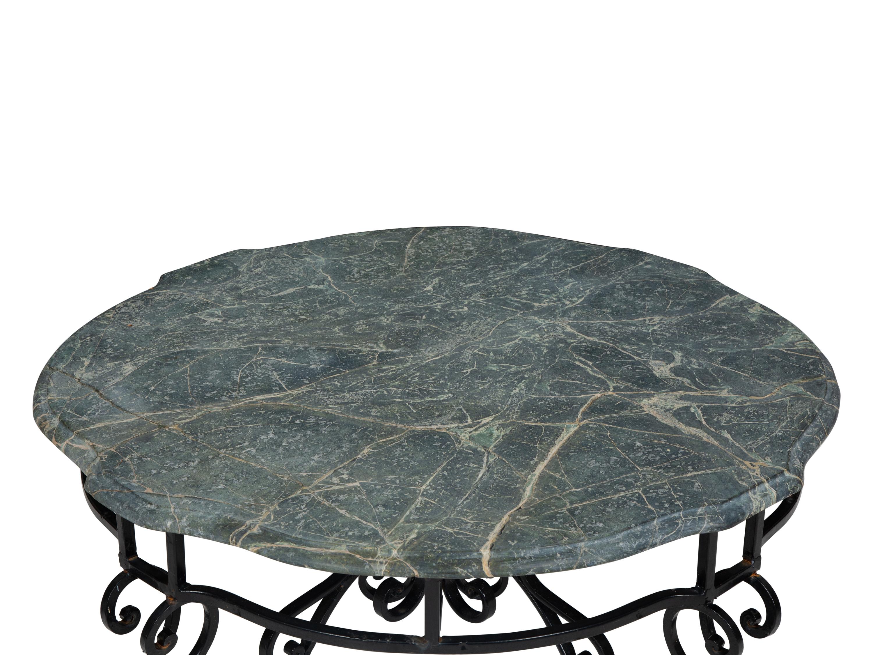 A Wrought Iron Marble-Top Coffee Table