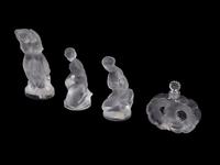 A Collection of Seven Lalique Glass Articles Height of tallest figure 5 1/2 inches.
