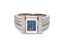 A 14 Karat White Gold, Irradiated Diamond and Diamond Ring,