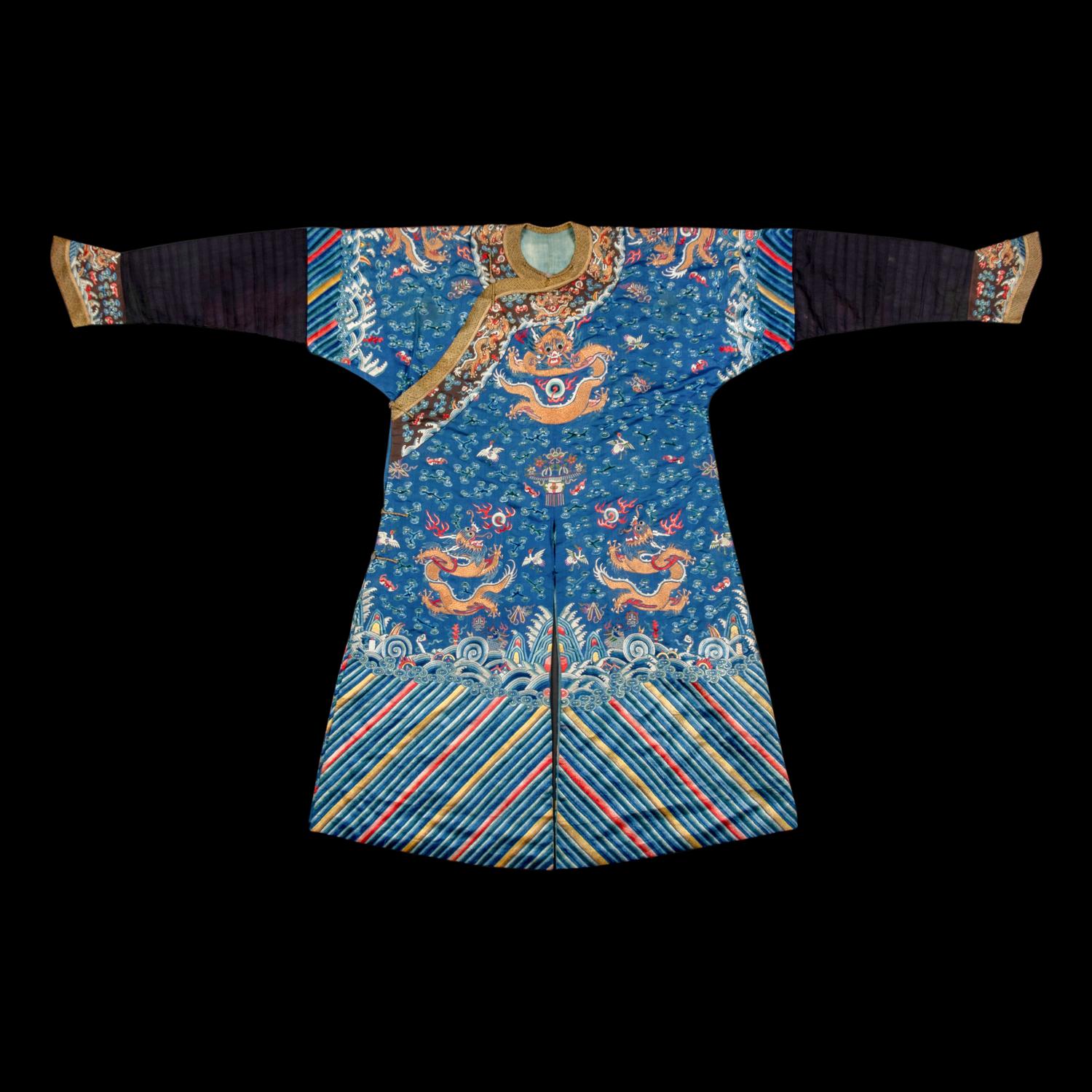 A Chinese Blue Ground Embroidered Silk 'Dragon' Robe, Jifu, 19th Century 清晚期 藍緞地綉云龍紋吉服