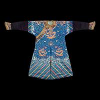 A Chinese Blue Ground Embroidered Silk 'Dragon' Robe, Jifu, 19th Century 清晚期 藍緞地綉云龍紋吉服