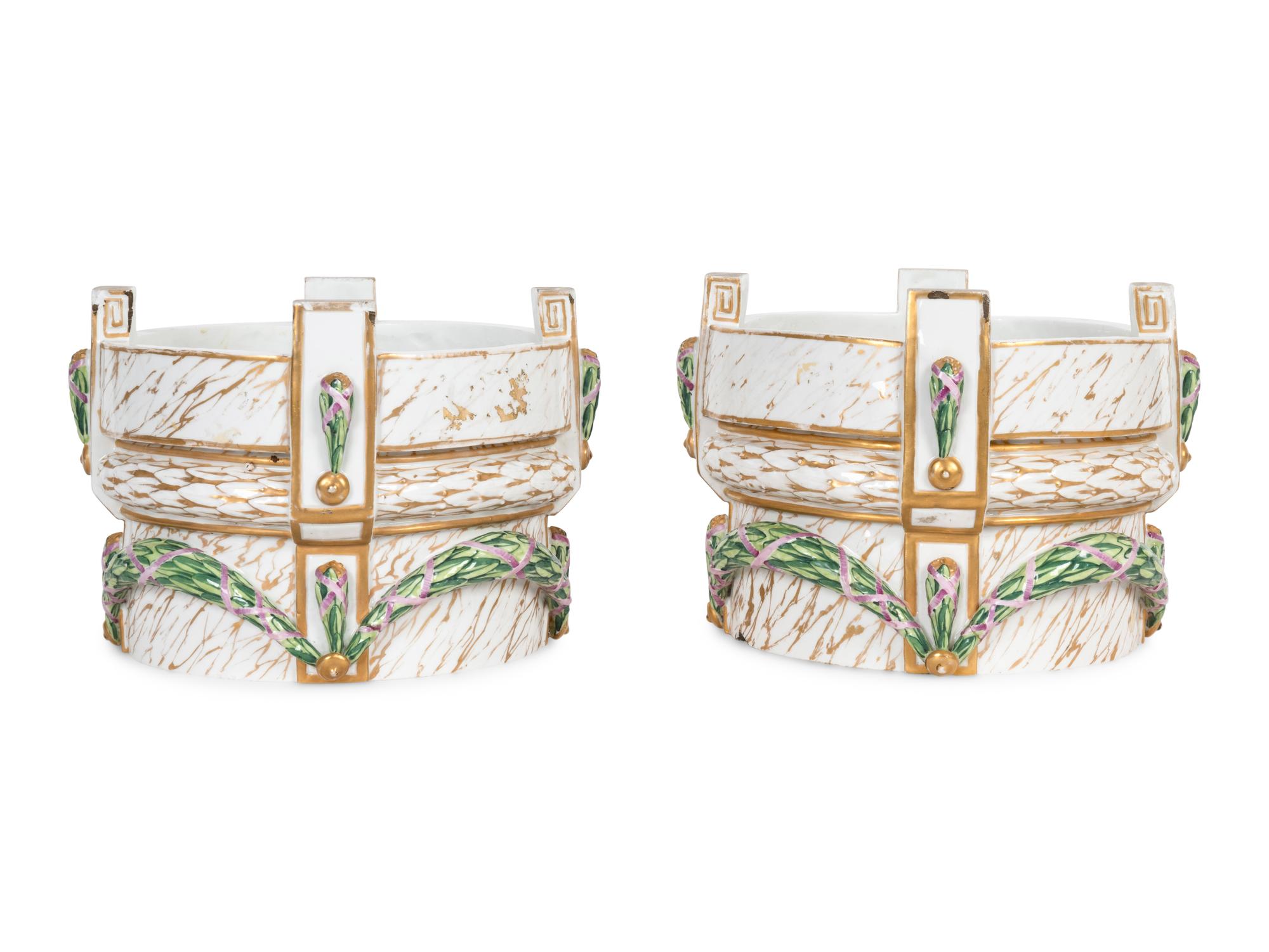 A Pair of Continental Porcelain Stands