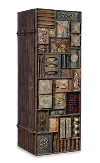 A Paul Evans Sculpture Front Cabinet Height 72 x width 24 x depth 24 1/2 inches. — CIRCA 1973