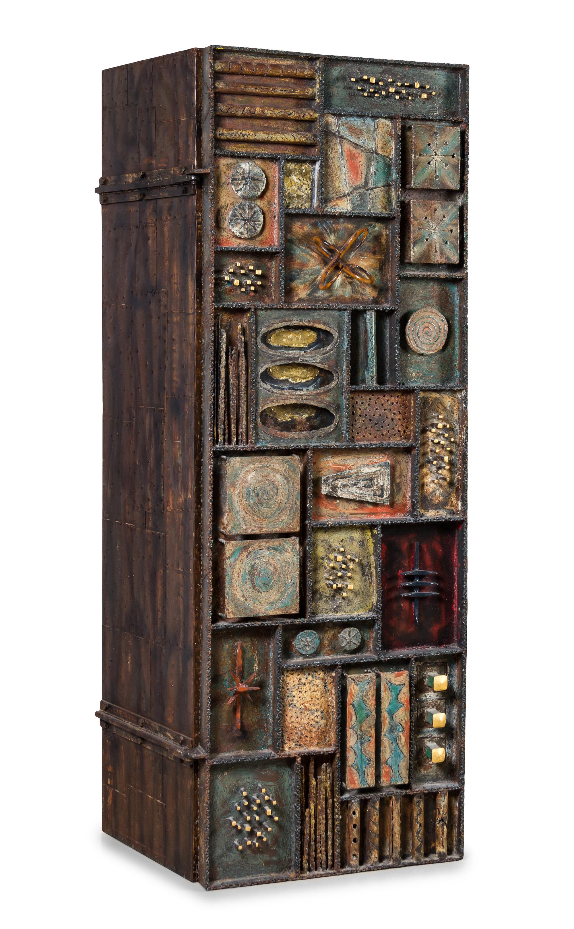 A Paul Evans Sculpture Front Cabinet Height 72 x width 24 x depth 24 1/2 inches. — CIRCA 1973
