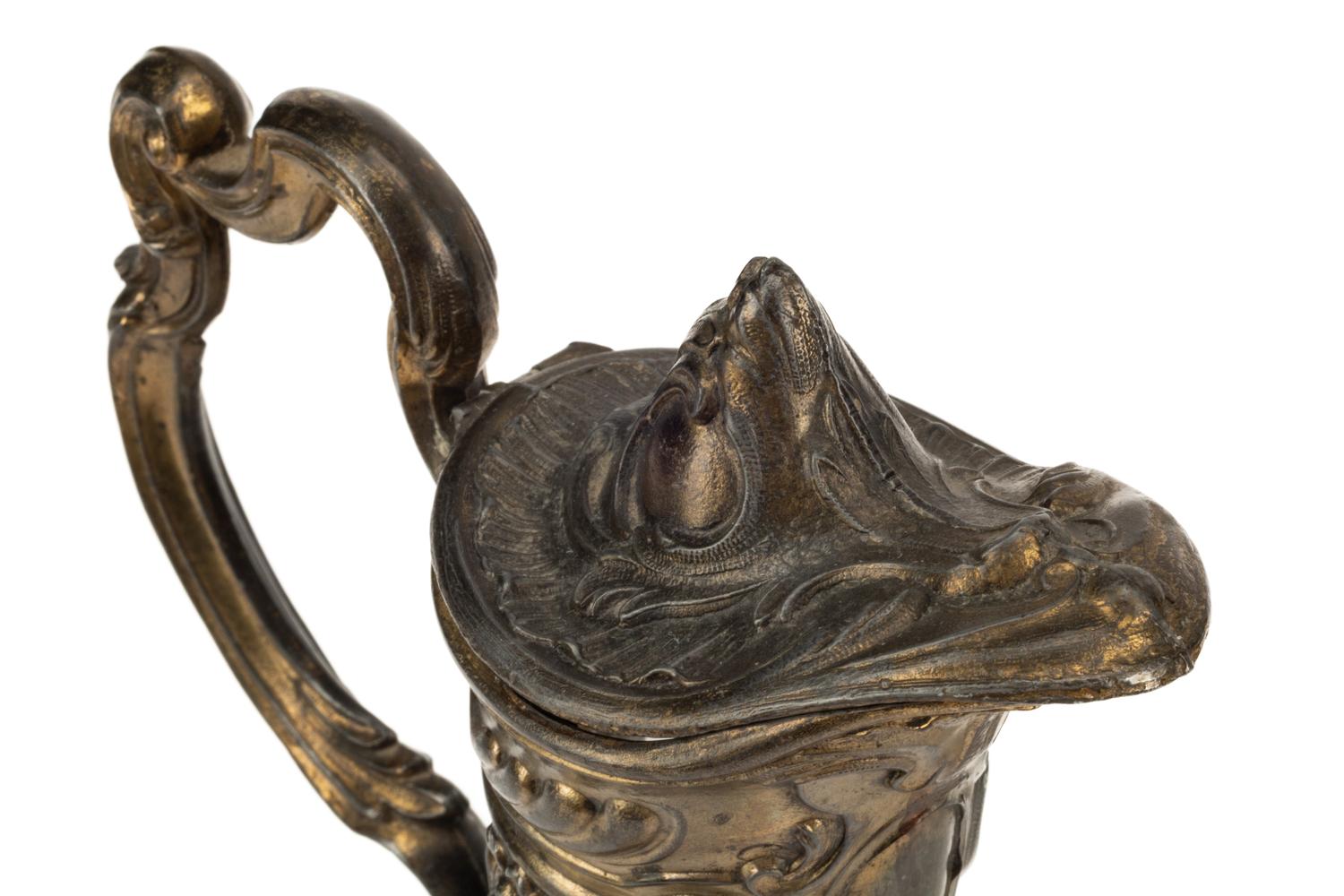 Two Continental Pewter Mounted Glass Claret Jugs