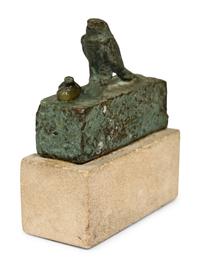 An Egyptian Bronze Falcon Coffin