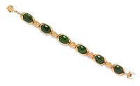 A 14 Karat Yellow Gold and Nephrite Jade Bracelet, 20.80 dwts.