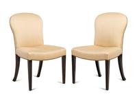 A Set of Eight Saddle Dining Chairs