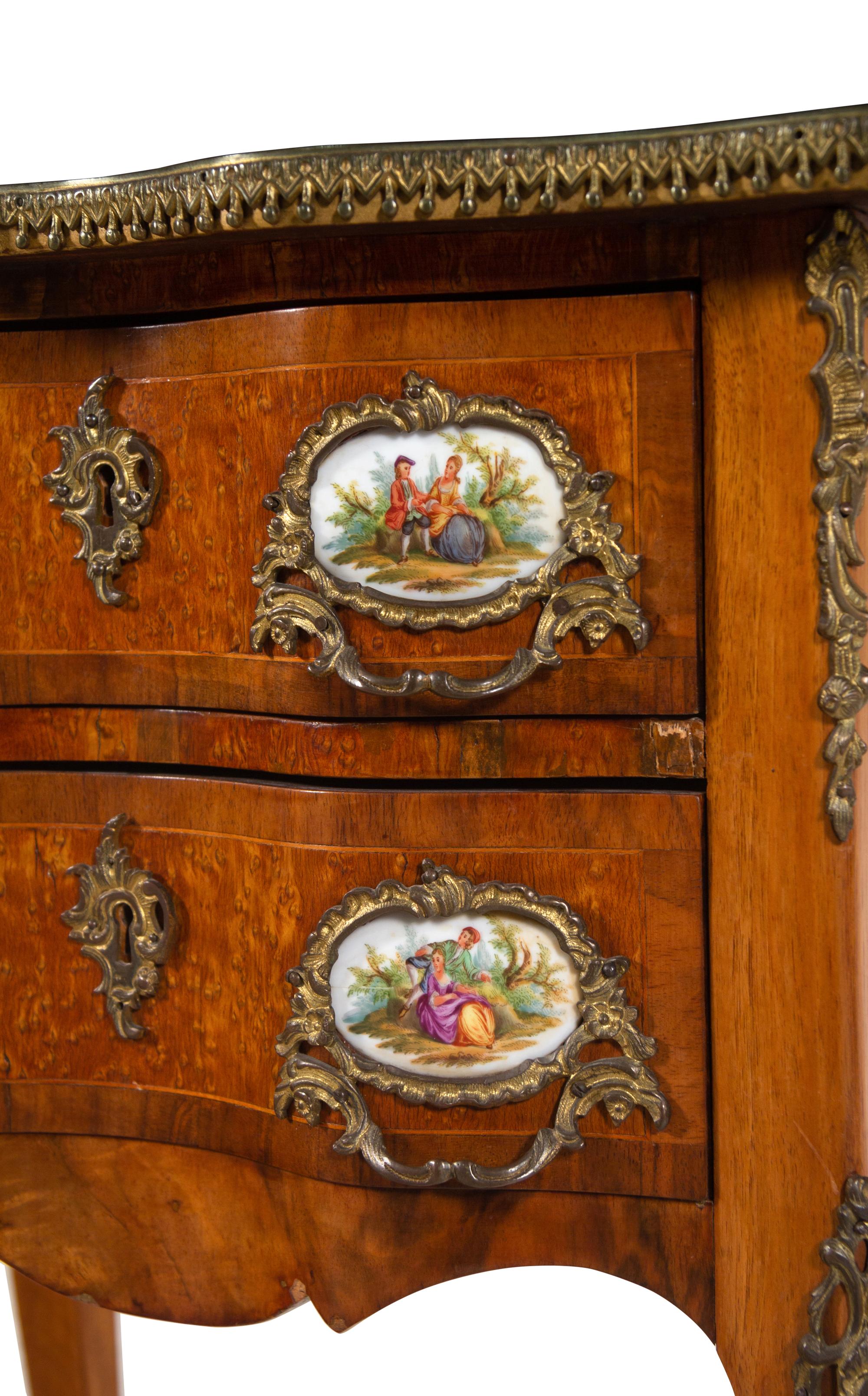 A Louis XV Style Gilt Metal and Porcelain Mounted Side Table