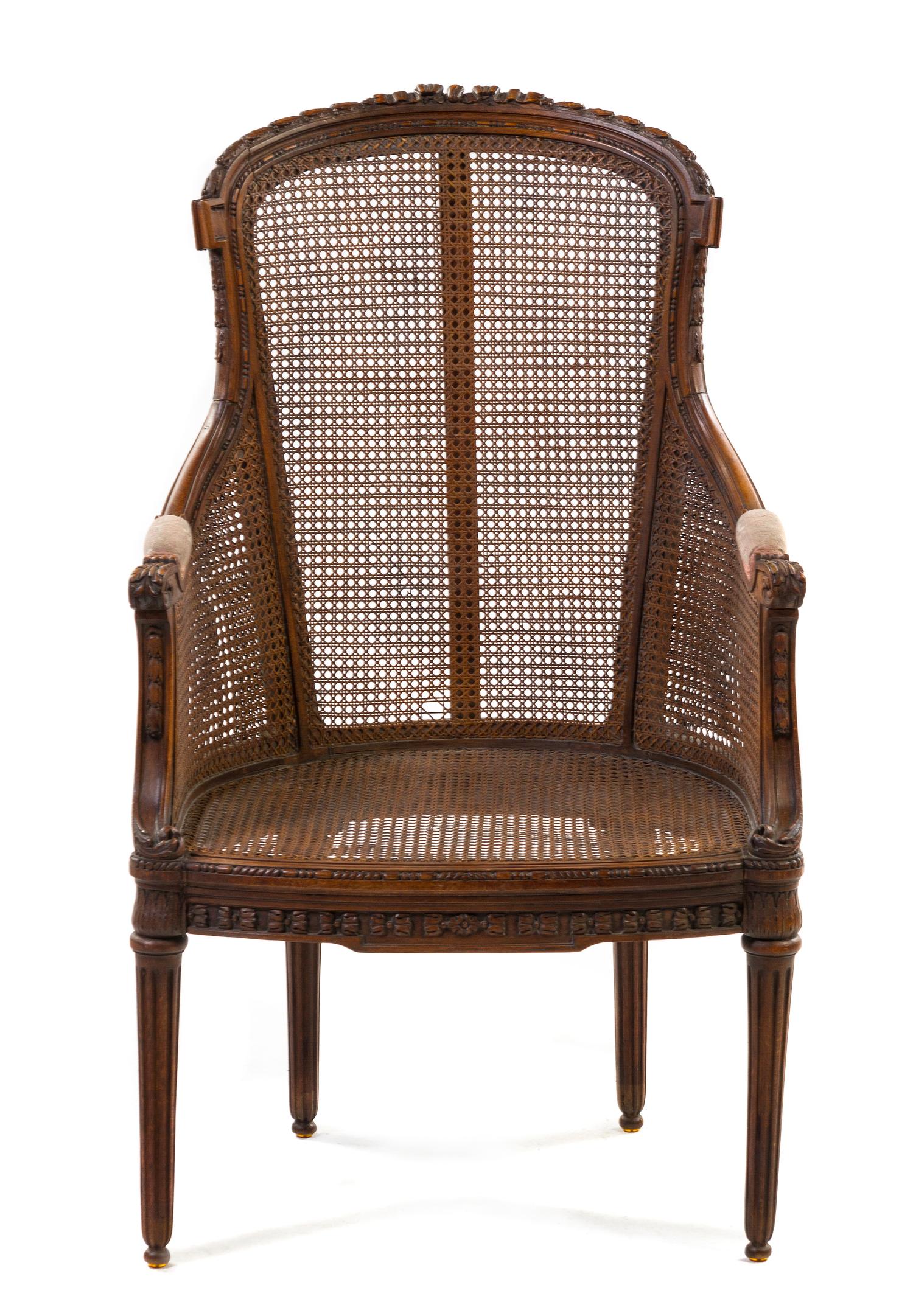 A Louis XVI Style Caned Bergere, Height 41 inches.