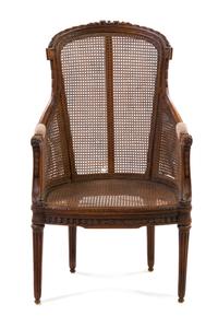 A Louis XVI Style Caned Bergere, Height 41 inches.