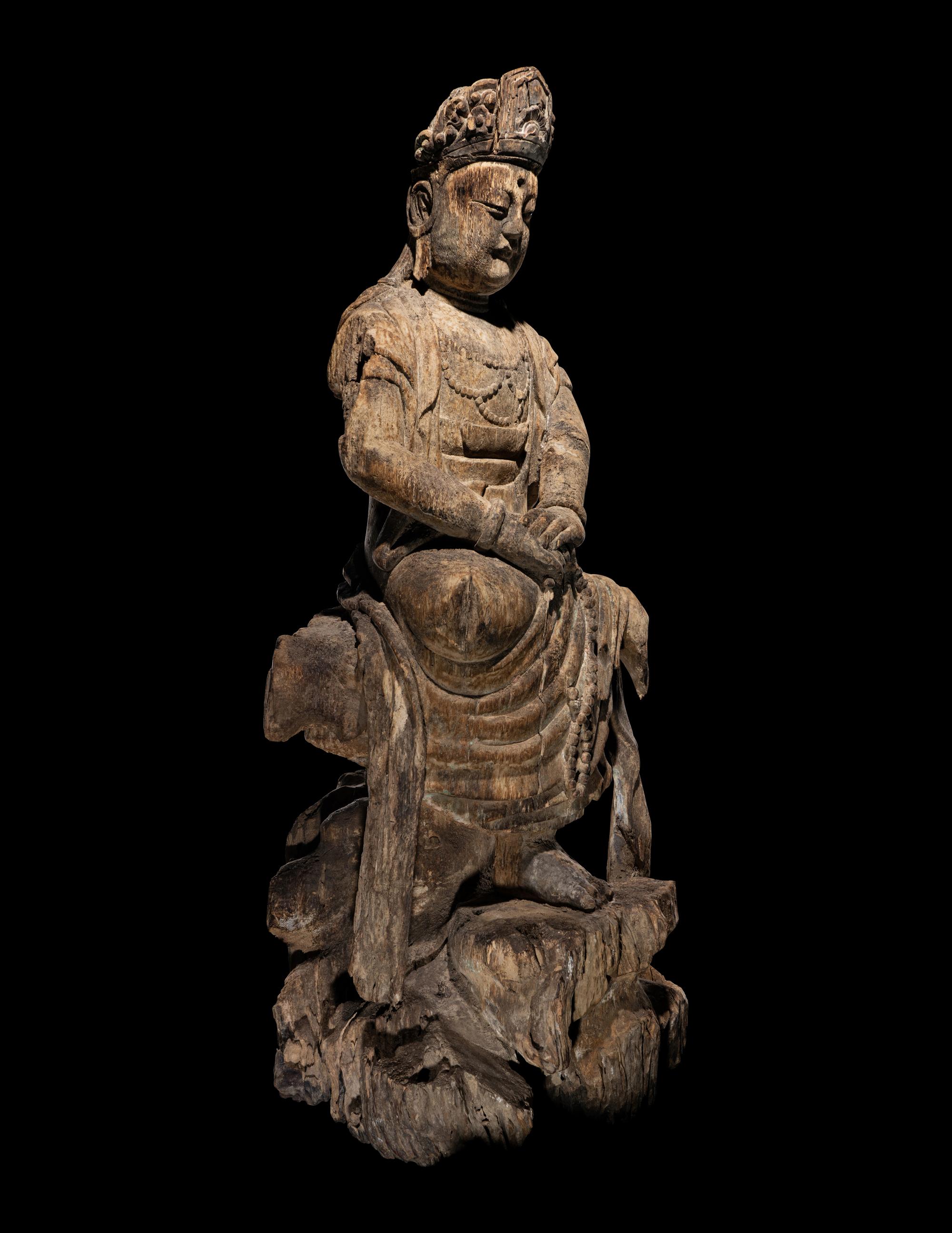 A Carved Wood Figure of Guanyin