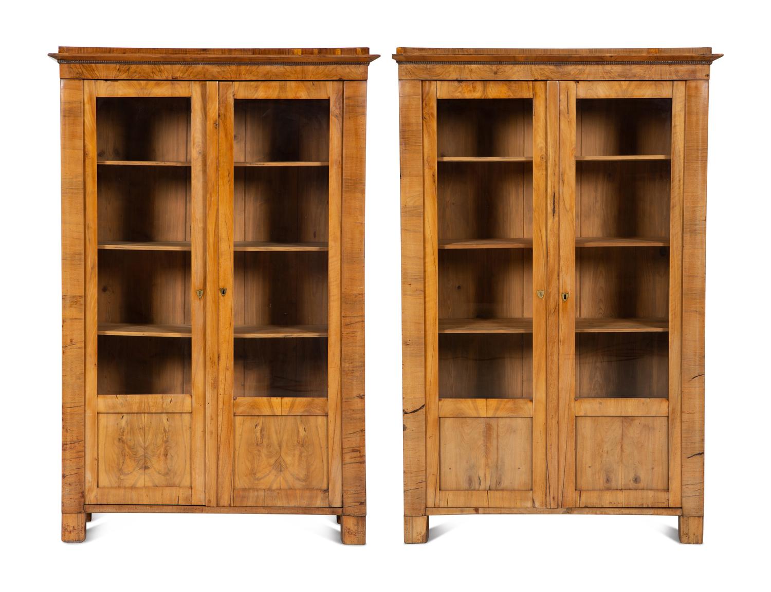 A Pair of Biedermeier Figured Birch Bookcases