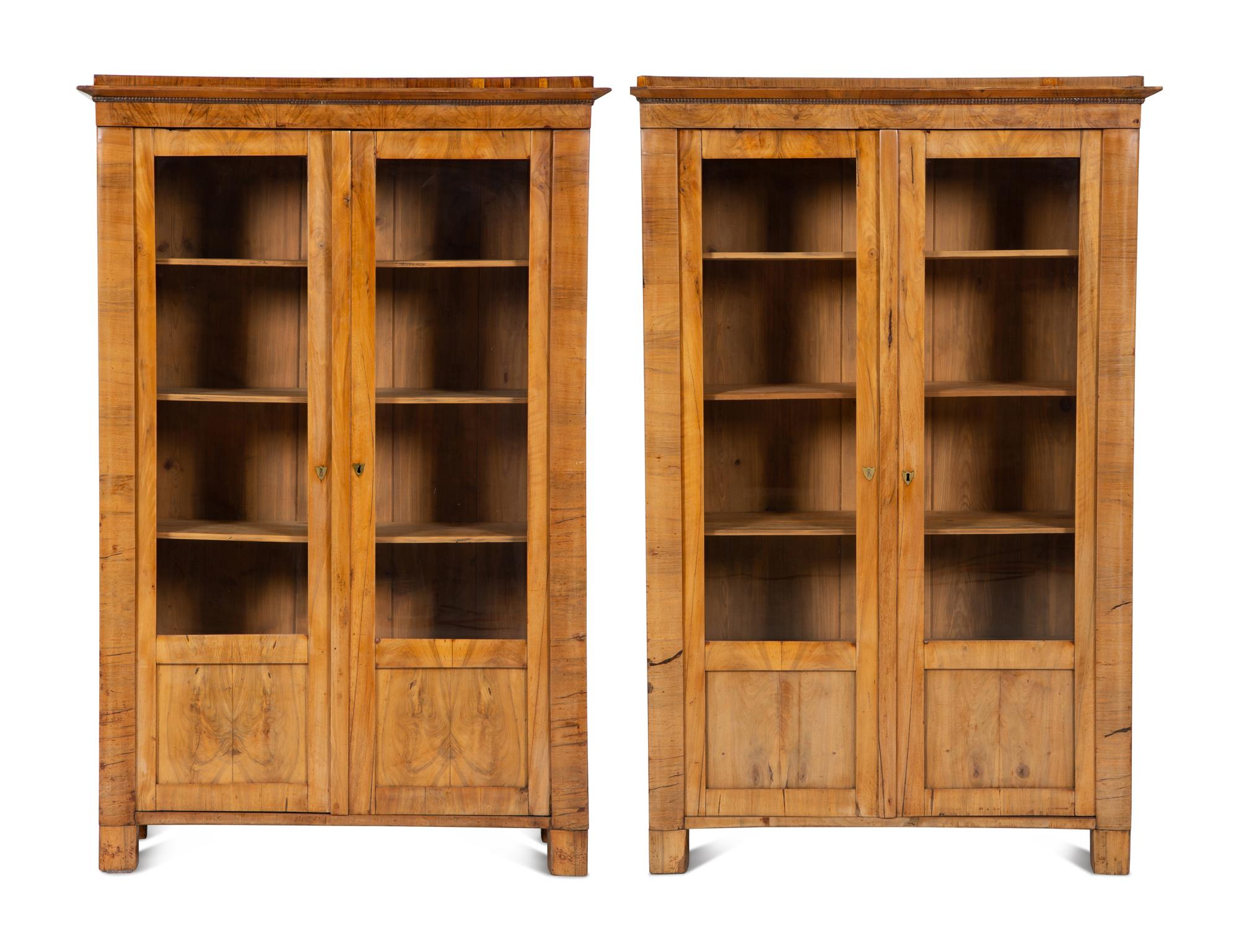 A Pair of Biedermeier Figured Birch Bookcases