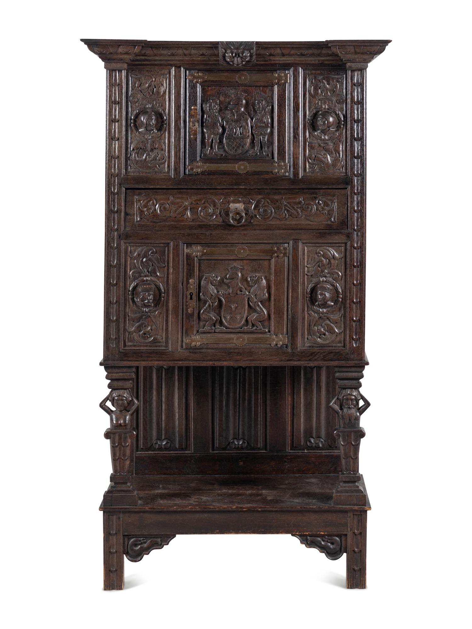 A Renaissance Style Carved Oak Cabinet