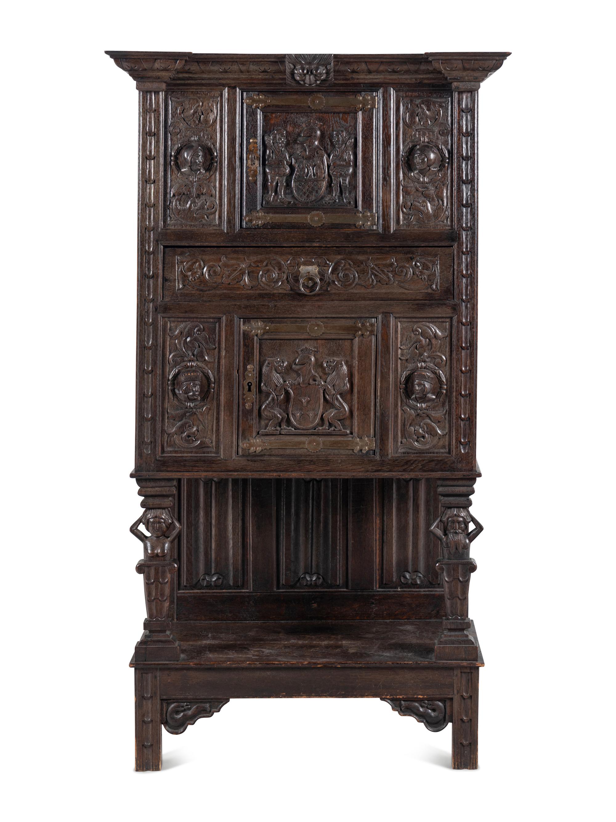A Renaissance Style Carved Oak Cabinet