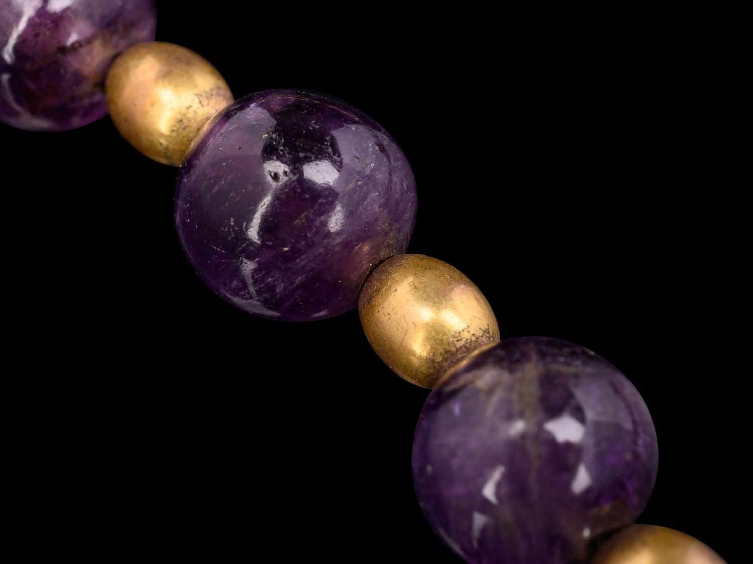 A Necklace of Amethyst and Gold Beads