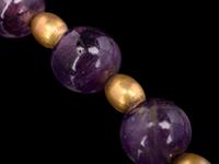 A Necklace of Amethyst and Gold Beads