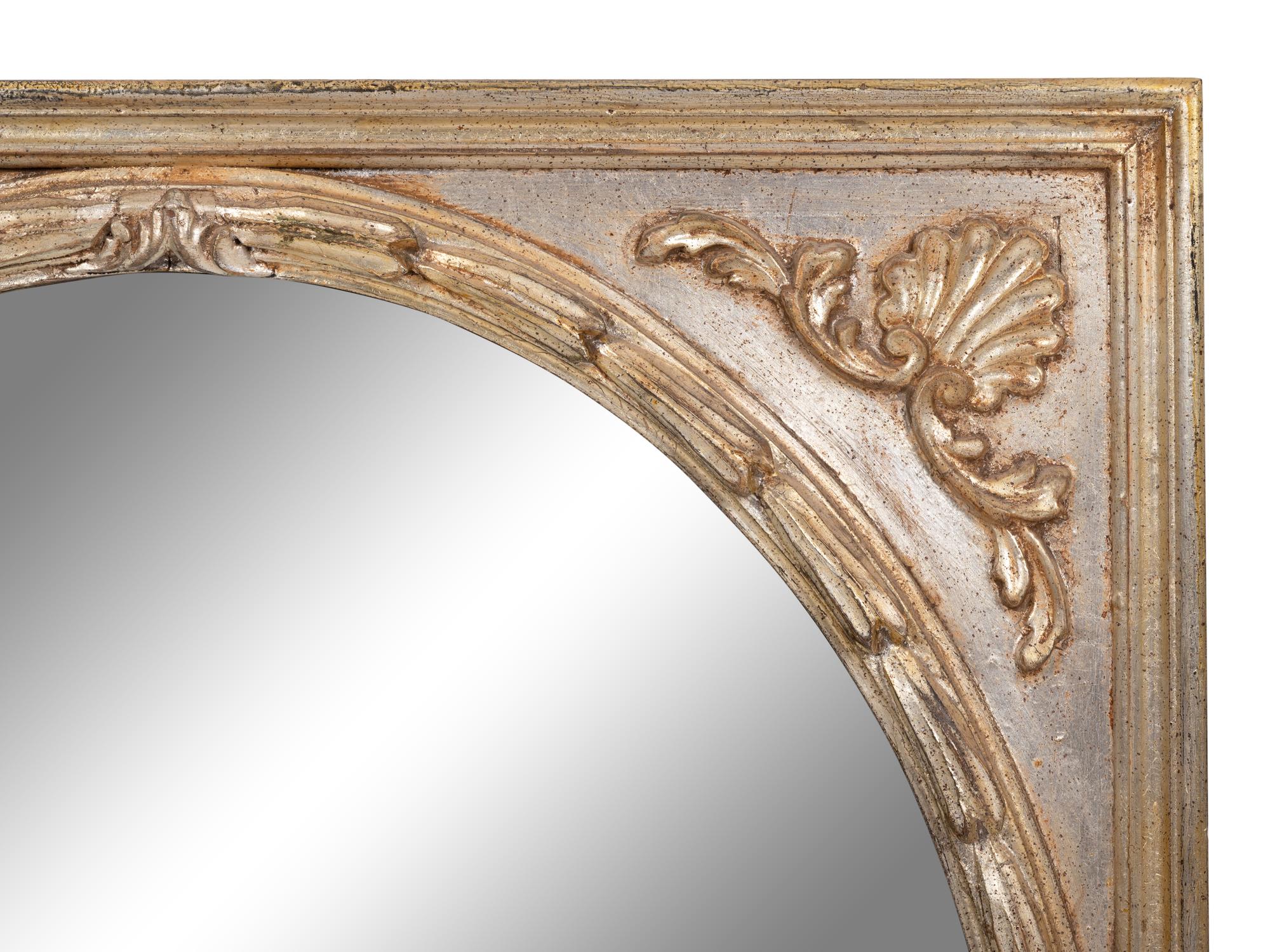 An Italian Silvered and Giltwood Mirror