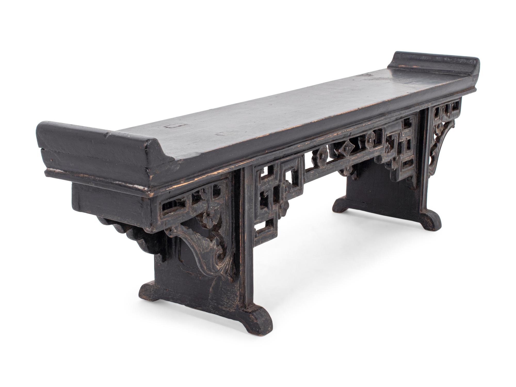 A Chinese Carved and Black Painted Hardwood Miniature Scholar's Table