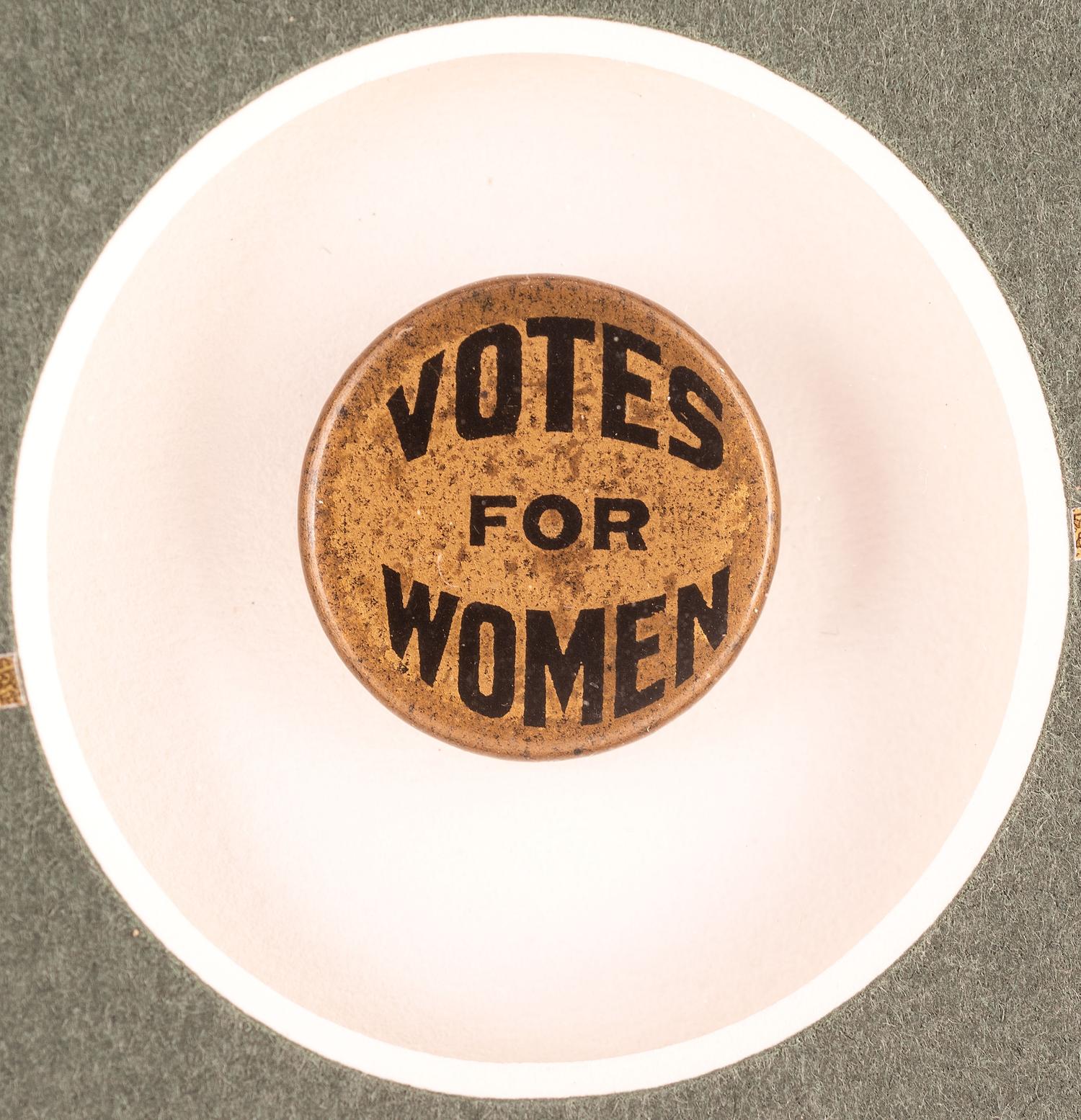 [WOMEN'S SUFFRAGE]. A collection of items belonging to women's rights activist Mariwyn Heath, incl. "Votes for Women" pennant, Veteran Feminists Medal of Honor, pinbacks, buttons, & pewter figures.