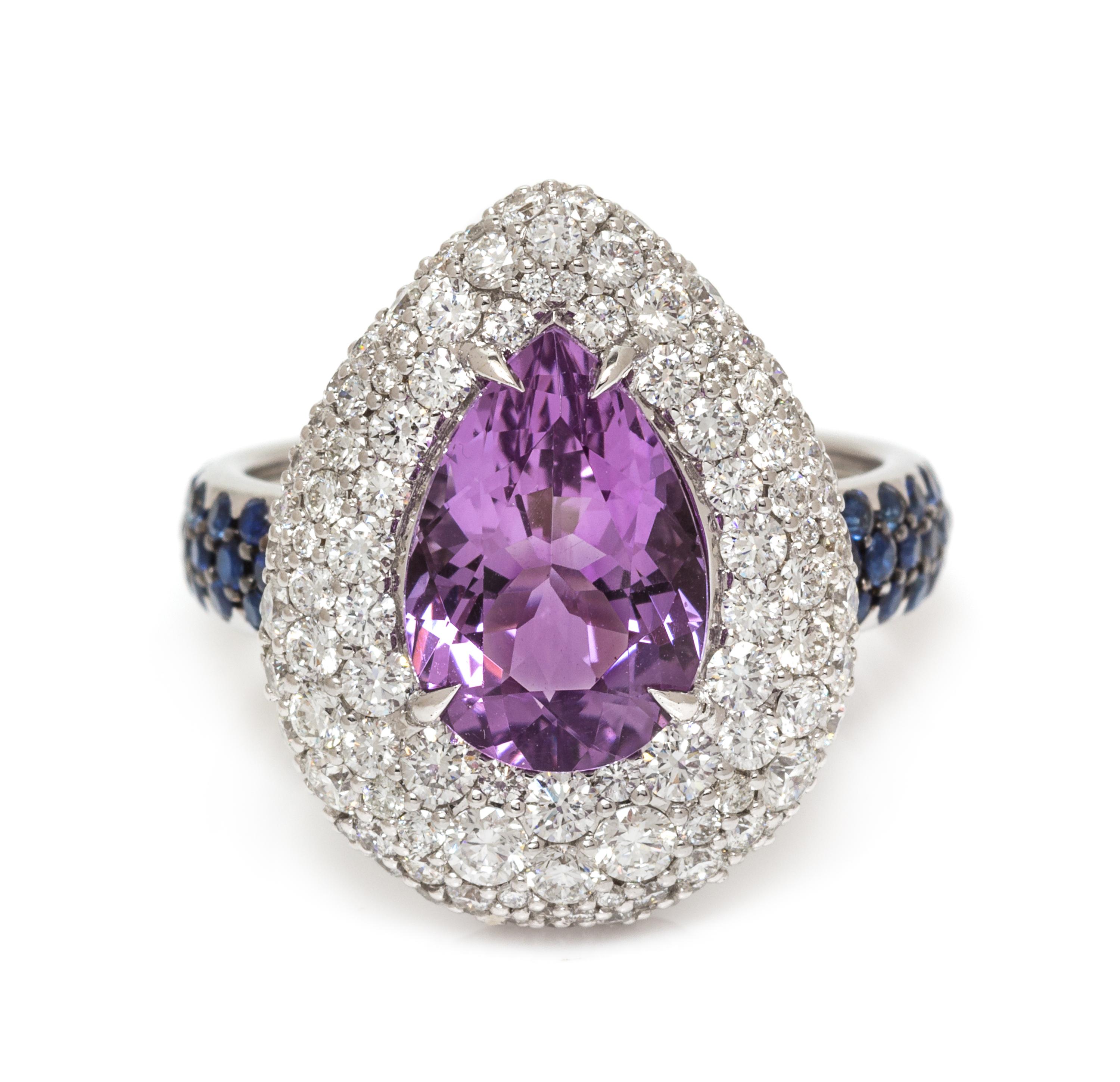 An 18 Karat White Gold, Amethyst, Diamond and Sapphire Ring, 7.40 dwts.