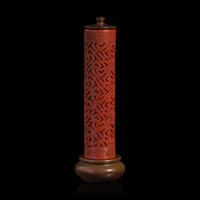 A Chinese Enameled Porcelain Faux Bronze and Lacquer Perfumier — 瓷胎仿剔紅萬字不到頭香筒