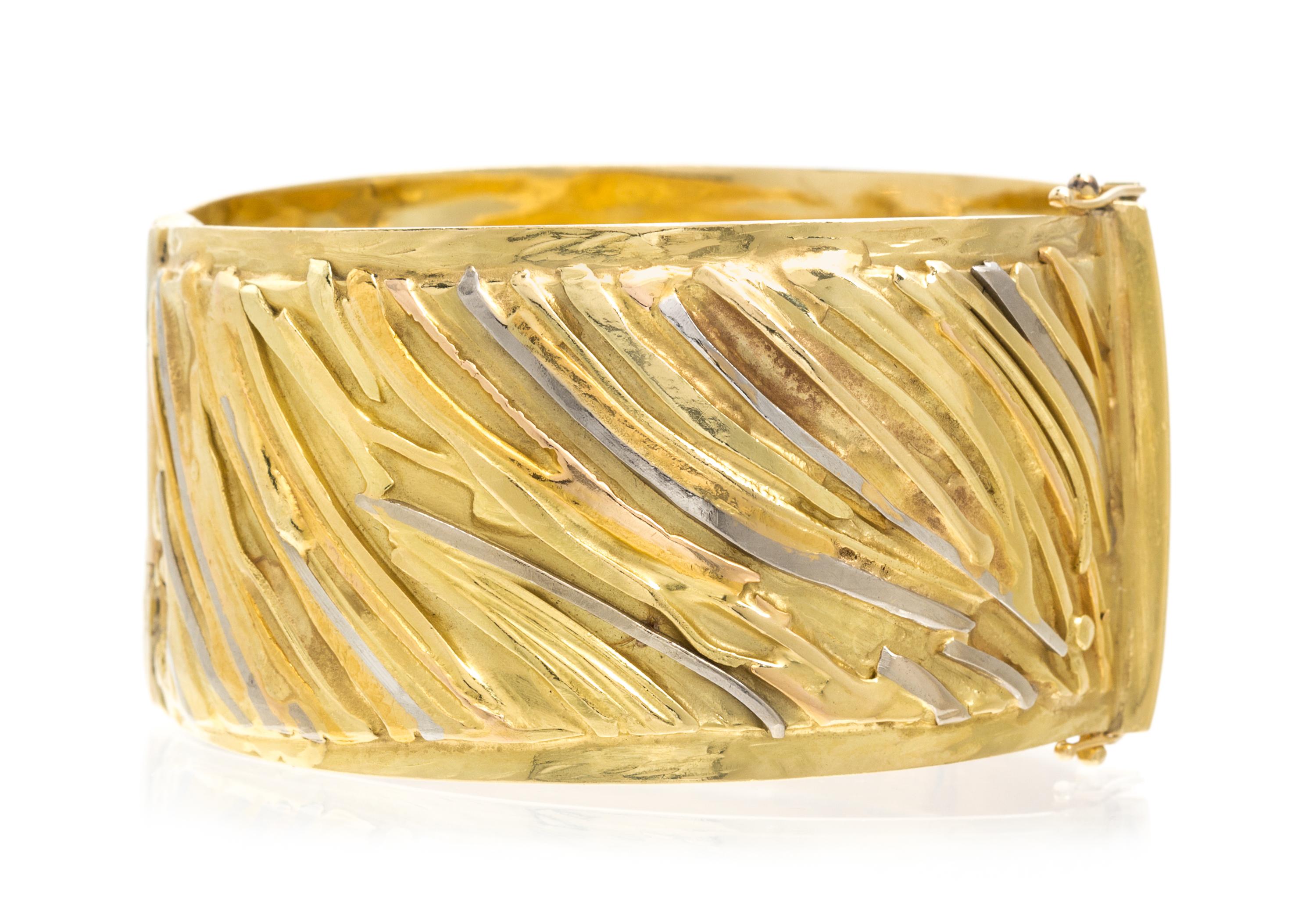 An 18 and 24 Karat Tri Color Gold Bangle Bracelet, Marne Ryan, 66.30 dwts.