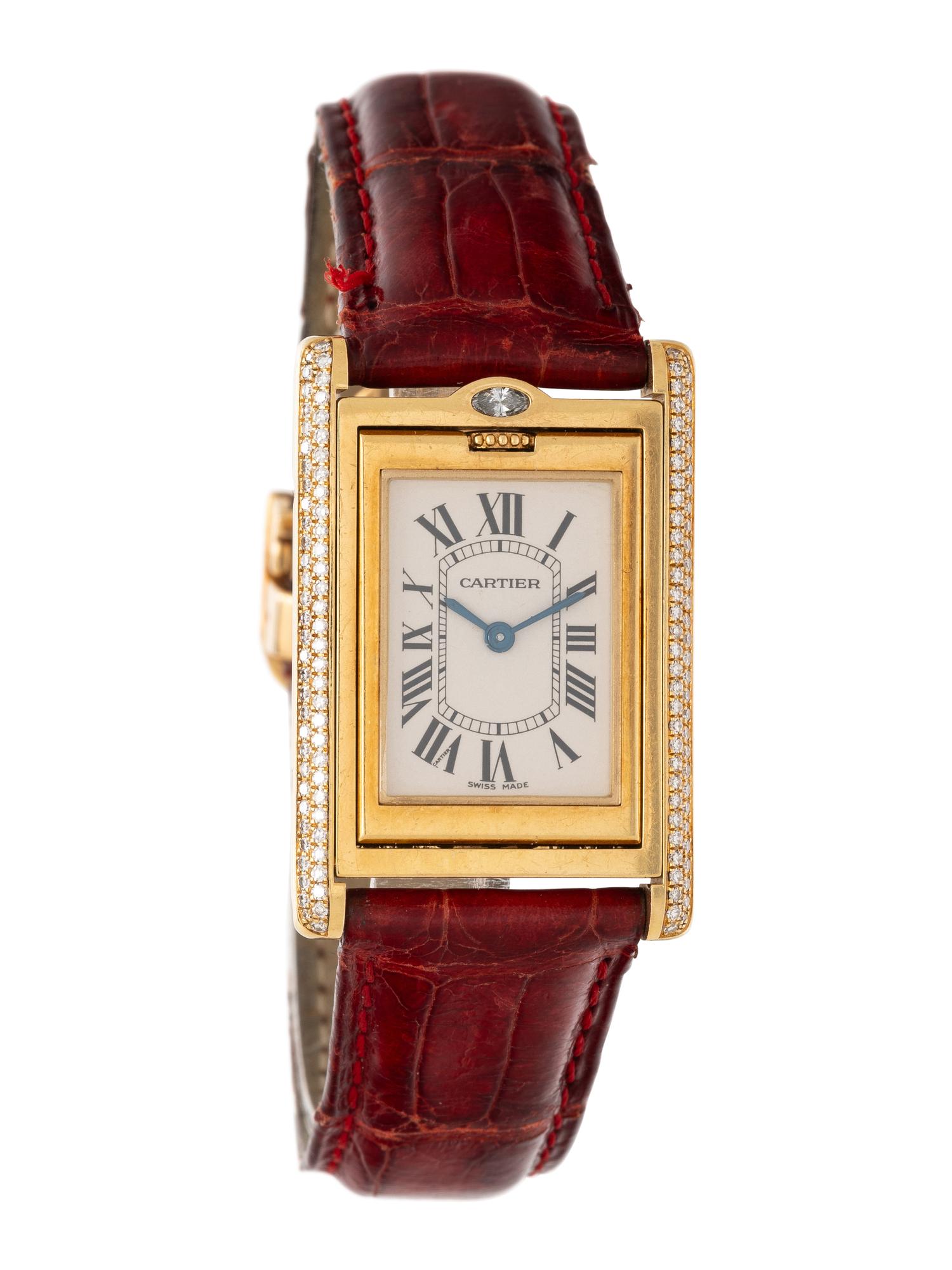CARTIER, REF. 2506 18K YELLOW GOLD AND FACTORY DIAMOND 'TANK BASCULANTE' WATCH WITH CARTIER DEPLOYANT BUCKLE