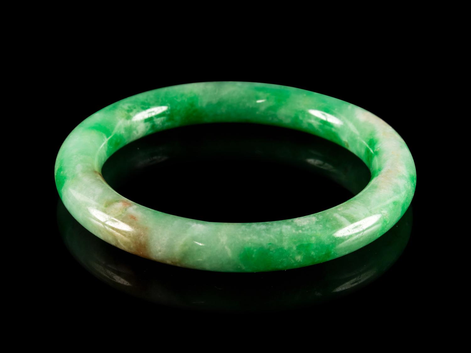A Chinese Green Jadeite Bangle