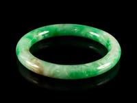 A Chinese Green Jadeite Bangle