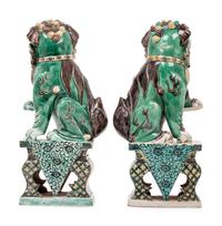 A Pair of Chinese Famille Verte Porcelain Figures of Fu Lions