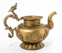 A Tibetan Style Gilt Metal Teapot Height 9 inches. — 20TH CENTURY