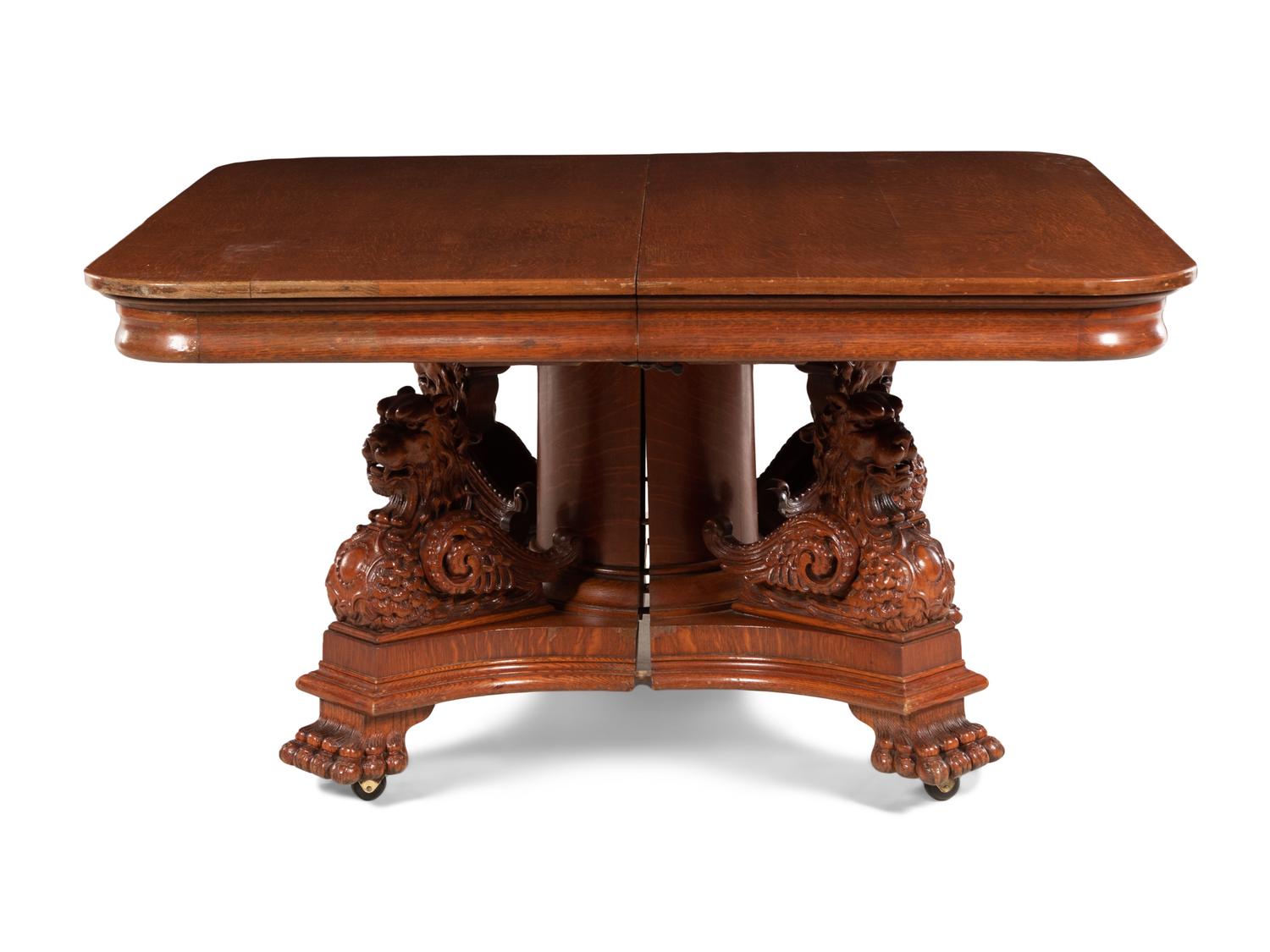 An American Renaissance Revival Carved Oak Extension Dining Table