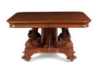 An American Renaissance Revival Carved Oak Extension Dining Table