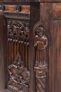A Gothic Revival Carved Oak Chest