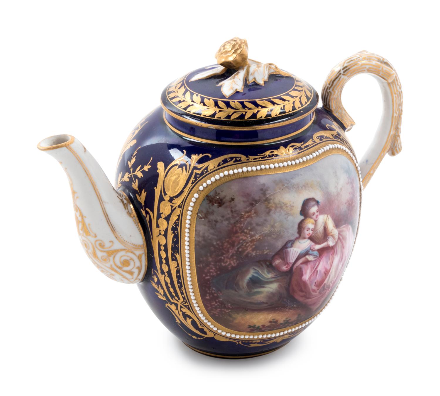 A Sèvres Style Painted, Parcel Gilt and "Jeweled" Porcelain Teapot