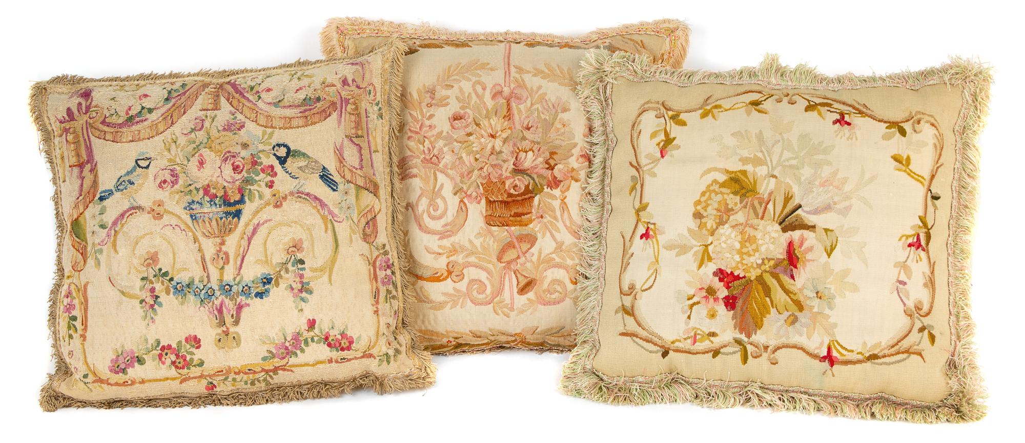 A Group of Nine Needlepoint and Aubusson Tapestry Pillows Largest 30 x 15 inches.