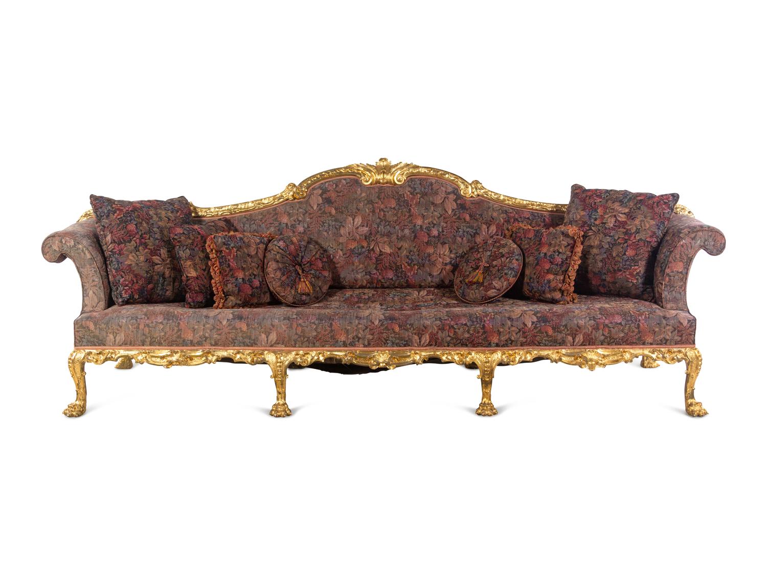 A Pair of George II Oversized Giltwood Canapés